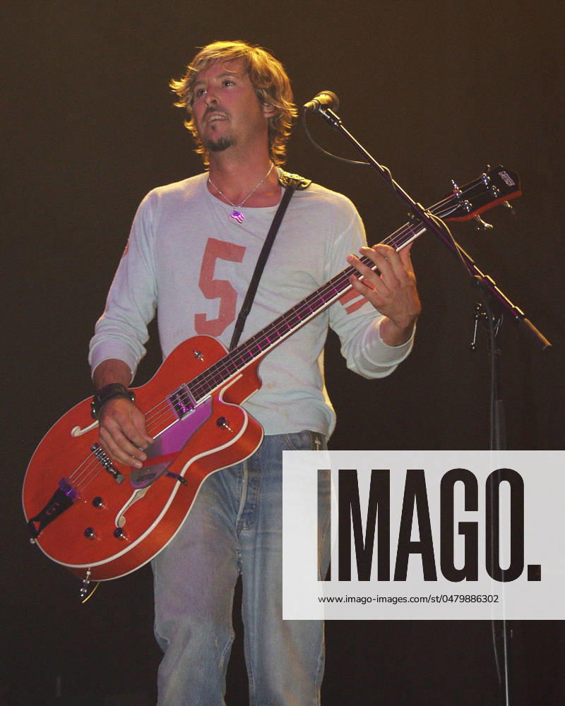 JULY 11: Charlie Colin of Train performs during the Jeep World Festival at Lakewood Amphitheatre in Atlanta, Georgia on July 11, 2002. CREDIT: Chris McKay MediaPunch