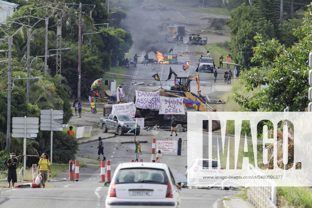 Macron Says French Troops Will Stay In New Caledonia Protesters wave Kanak flags at an independantist roadblock in Avenue d?Auteuil in Noumea, France s Pacific territory of New Caledonia, on May 22, 2024. French security forces will remain in New Caledonia as long as necessary, Emmanuel Macron has said, after France?s president arrived in the Pacific territory in an urgent attempt to calm tensions after more than a week of riots that have left six dead. Photo by MMIIAS ABACPRESS.COM Noumea France