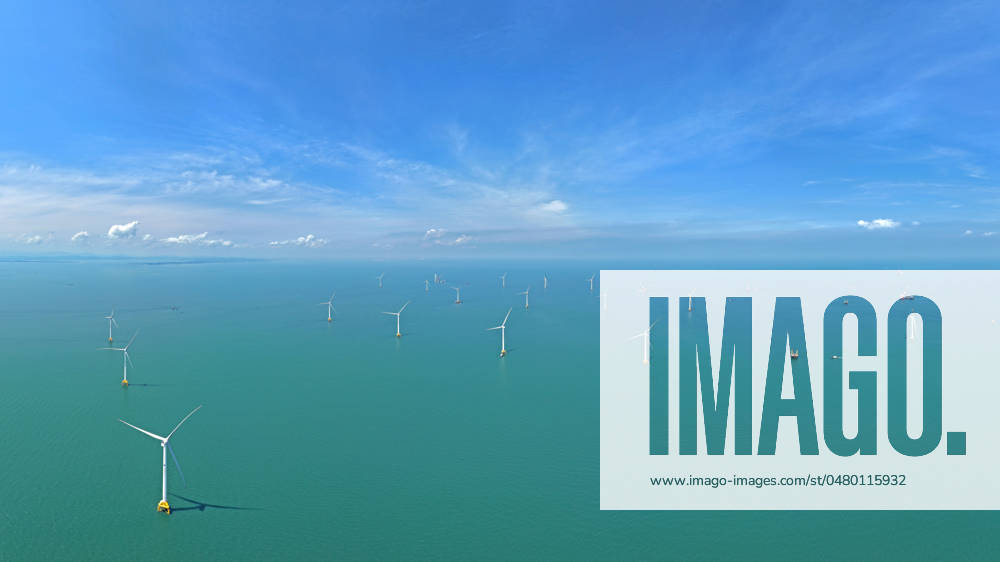 (240523) -- BEIJING, May 23, 2024 -- An aerial drone photo taken on May 21, 2024 shows the construction site of a wind farm off the coast of Fangchenggang, south China s Guangxi Zhuang Autonomous Region. The wind farm under construction is Guangxi s first wind power demonstration project, that will comprise 83 wind turbine units. ) XINHUA PHOTOS OF THE DAY ZhouxHua