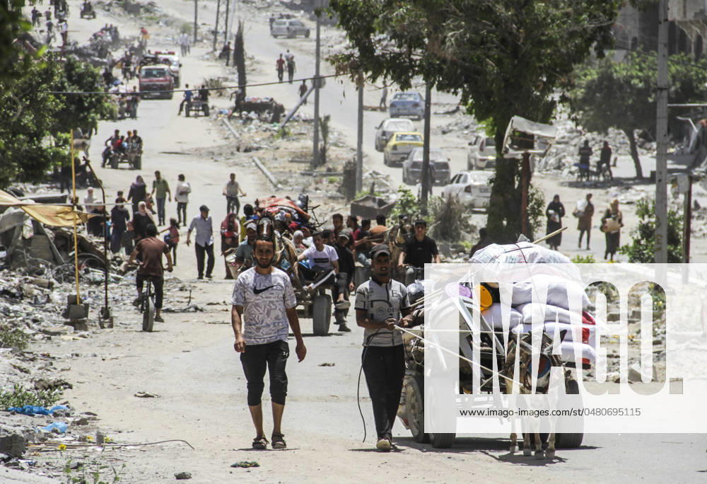(240524) -- GAZA, May 24, 2024 -- Palestinians fleeing from Jabalia in northern Gaza Strip arrive in Gaza City, on May 24, 2024. Earlier on Thursday, Israel s state-run Kan radio reported that the Israeli army continued its ground operations in the southernmost Gazan city of Rafah, as well as in Jabalia and Beit Hanoun in northern Gaza, during which the army killed several terrorists, eliminated hostile cells, and seized many weapons and rocket launching platforms. The Palestinian death toll from ongoing Israeli attacks on the Gaza Strip has risen to 35,857, Gaza health authorities said in a press statement on Friday. (Photo by Xinhua) MIDEAST-GAZA CITY-PALESTINIANS-JABALIA-FLEEING-ARRIVAL MahmoudxZaki