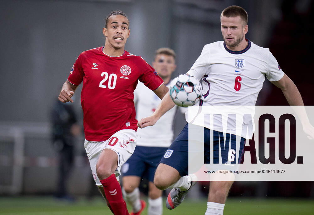 Denmarks Yussuf Poulsen and Englands Eric Dier during the Nations League match between Denmark and England in the Park, Tuesday 8 September 2020, Copenhagen Denmark
