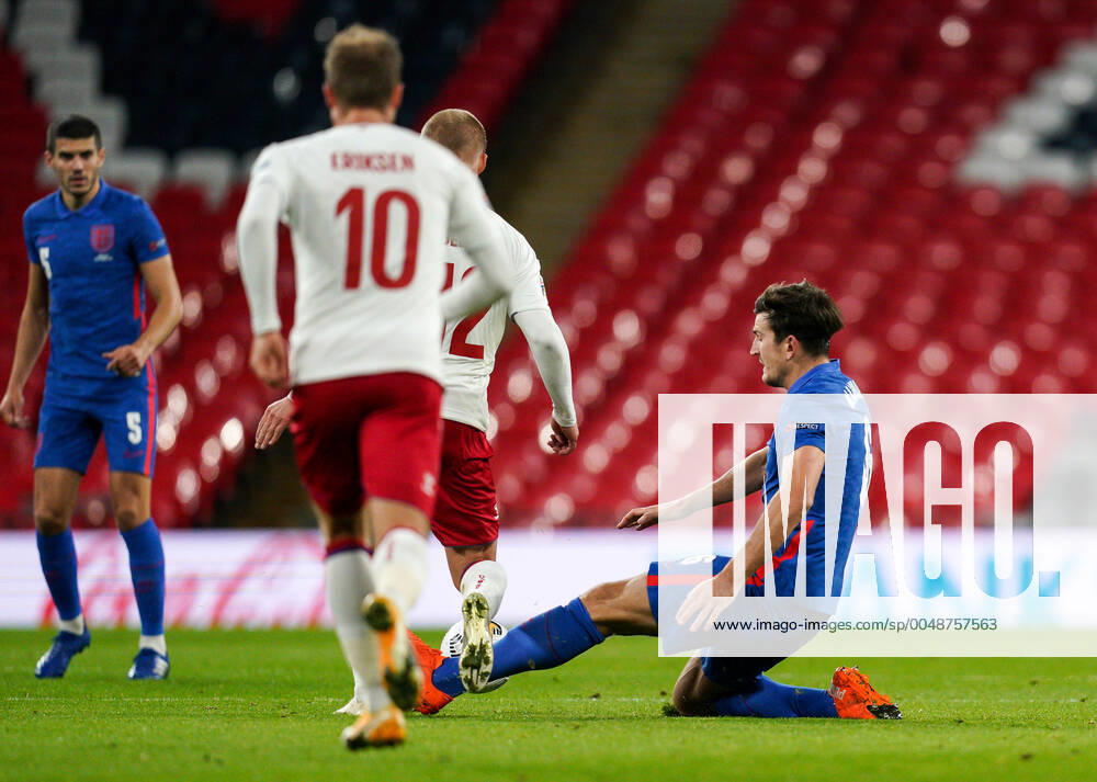 Harry Maguire Manchester United, ManU of England fouls Kasper Dolberg (Nice) of Denmark and is subsequently sent off for a 2nd yellow card during the UEFA Nations League match played behind closed doors due to the current government Covid-19 rules within sports venues between England and Denmark at Wembley Stadium, London, England on 14 October 2020.