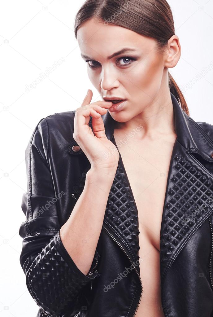 Fashion style girl portrait. Beautiful fashion woman with professional styling, hairdress and makeup. model released