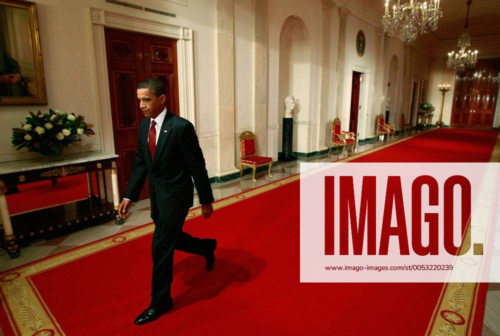 President Barack Obama walks into the East Room for his fourth prime time televised news conference at the White House in Washington on July 22, 2009. Obama used the news conference to push his and Congress plan to overhaul the American health care system. (UPI Photo Chip Somodevilla Pool) U.S. President Obama speaks at press conference in Washington WAX200907223307
