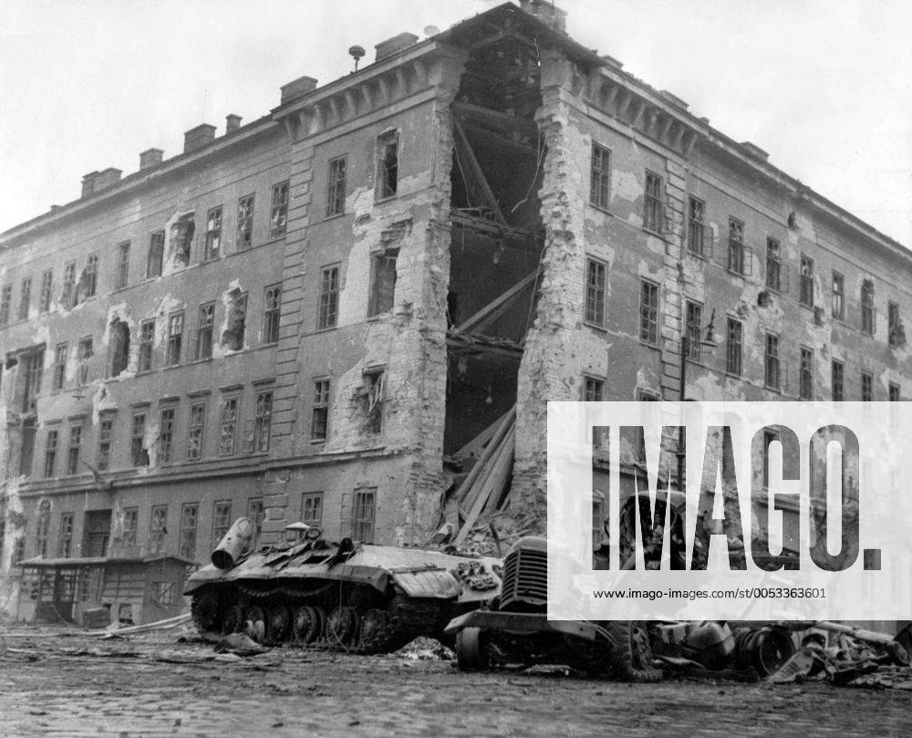 Nov 01, 1956 - Budapest, Hungary - The Hungarian Revolution of 1956 was a spontaneous nationwide revolt against the Stalinist government of Hungary and its Soviet-imposed policies, lasting from 23 October until 10 November 1956. It began as a student demonstration which attracted thousands as it marched through central Budapest to the Parliament building. After the revolt spread quickly across Hungary, and the government fell, thousands organized into militias, battling the State Security Police and Soviet troops. On 4 November, a large Soviet force invaded Budapest. By January 1957, the new Soviet-installed government had suppressed all public opposition. PICTURED: Destroyed soviet tank. Budapest Hungary - ZUMAk09