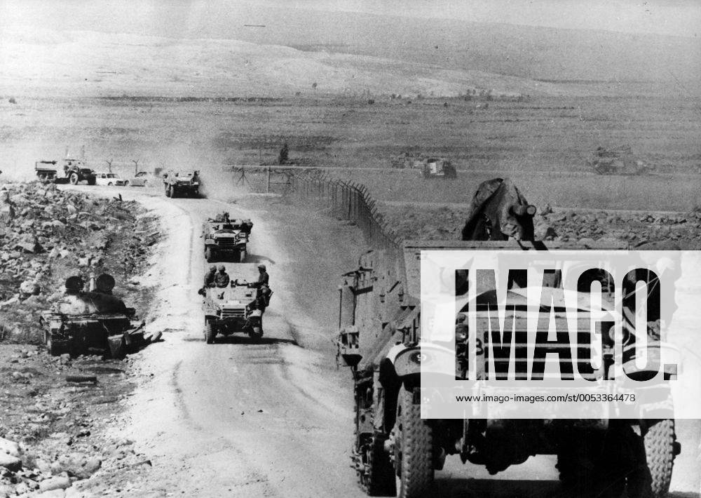 Oct 01, 1973 - Golan Heights, Israel - Also known as the Fourth Arab-Israeli War, Yom Kippur War was fought from October 6 to October 26, 1973 by a coalition of Arab states led by Egypt and Syria against Israel. The war began with a surprise joint attack by Egypt and Syria on the Jewish holiday of Yom Kippur. Egypt and Syria crossed the cease-fire lines in the Sinai and Golan Heights, respectively, which had been captured by Israel in 1967 during the Six-Day War. Many Arab states contributed troops and financial support, and the USSR also provided assistance but ultimately the Arabs buckled under a sustained Israeli counter-attack strengthened by US airlifts. PICTURED: Israeli military column on its way to Syria. Golan Heights Israel - ZUMAk09