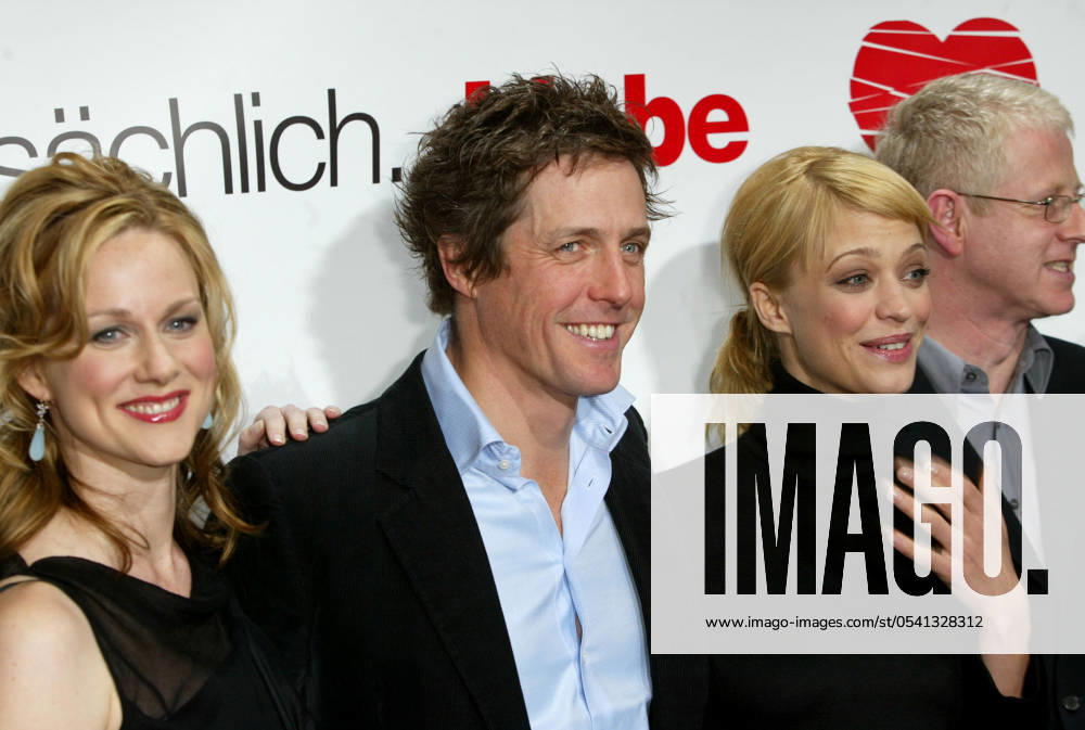 Laura Linney, Heike Makatsch and Hugh Grant at the premiere for Love Actually, Germany, 14 November 2003. FAM12116