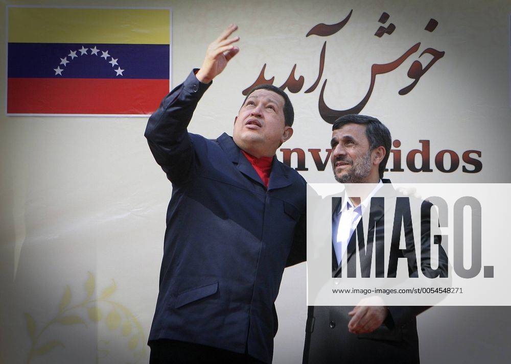 (101020) -- TEHRAN, Oct. 20, 2010 (Xinhua) -- Venezuela s President Hugo Chavez (R) gestures, as he meets with Iran s President Mahmoud Ahmadinejad during a welcoming ceremony in Iran s presidential mansion in Tehran, capital of Iran, Oct. 19, 2010. (Xinhua Ahmad Halabisaz) IRAN-VENEZUELA-MAHMOUD AHMADINEJAD-CHAVEZ-WELCOME CEREMONY