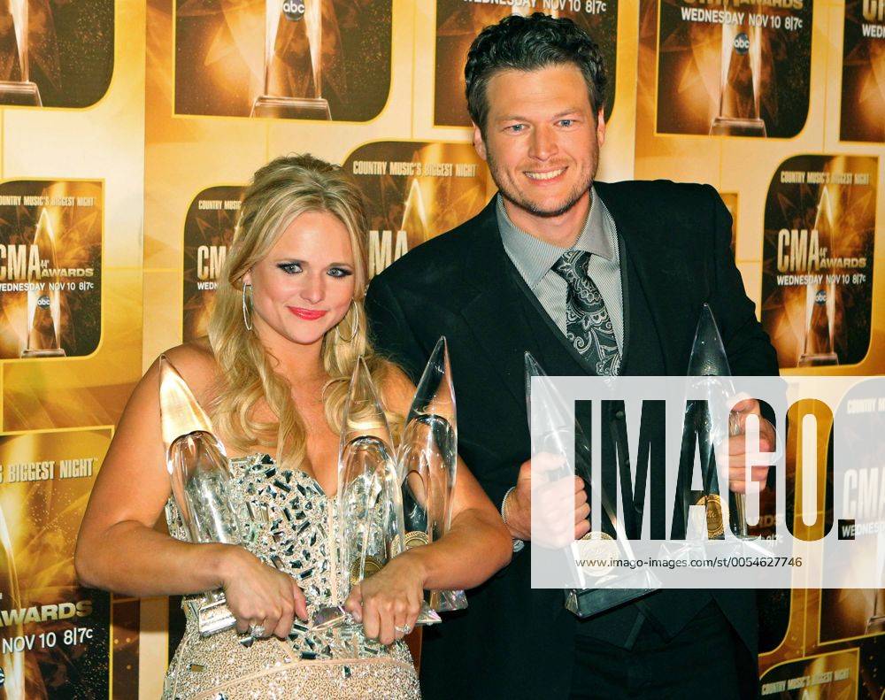 Miranda Lambert and Blake Shelton pose with their awards during the 44th Annual Country Music Awards in Nashville, Tennessee on November 10, 2010. CMA20101110449