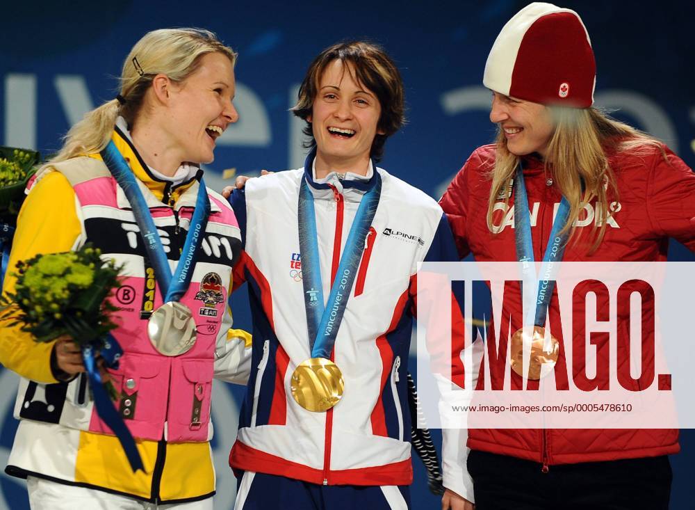 L-R: Stephanie Beckert of Germany (silver), Martina Sablikova of the Czech Republic (gold) and Kristina Groves of Canada (bronze) celebrate their medals in women s 3000 meter speed skating during a Medal Ceremony at BC Place in Vancouver, Canada, during the 2010 Winter Olympics on February 14, 2010. OLY201002141125 o0 Olympiasieg Sieg Siegerehrung Medaille Gold Silber Bronze Freude Objekte