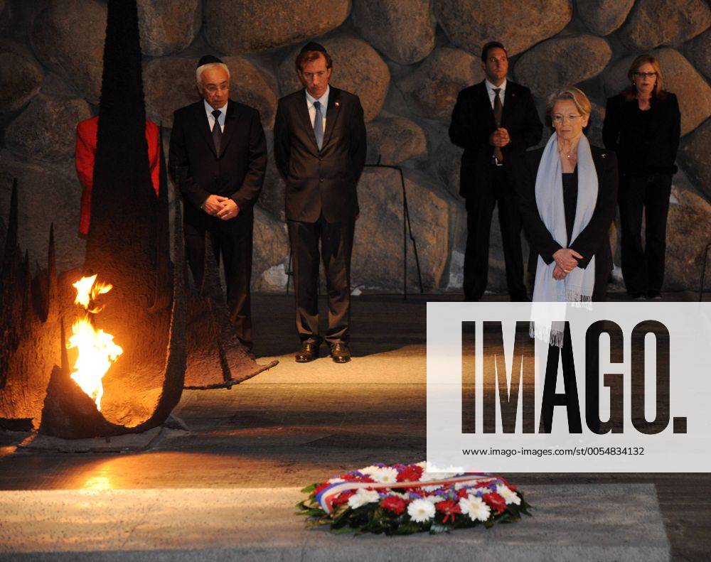 The Foreign Minister of France, Michele Alliot-Marie, pauses for a moment of silence in memory of the victims of the Holocaust in the Hall of Remembrance in the Yad Vashem Holocaust Museum in Jerusalem, Israel, January 20, 2011. JER2011012010