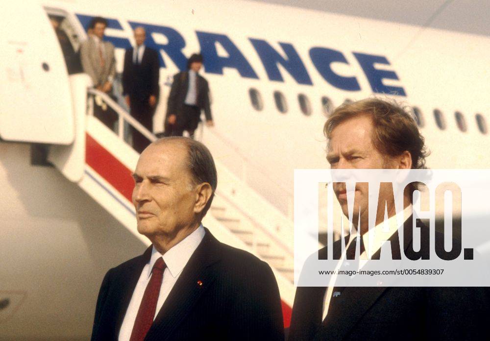 Czechoslovak President Vaclav Havel,right, and French President Francois Mitterrand at Prague s Ruzyne airport on Mitterrand s arrival for an official visit to Czechoslovakia on September 13, 1990. CTK Photo Michal Krumphanzl CTKPhoto00476895