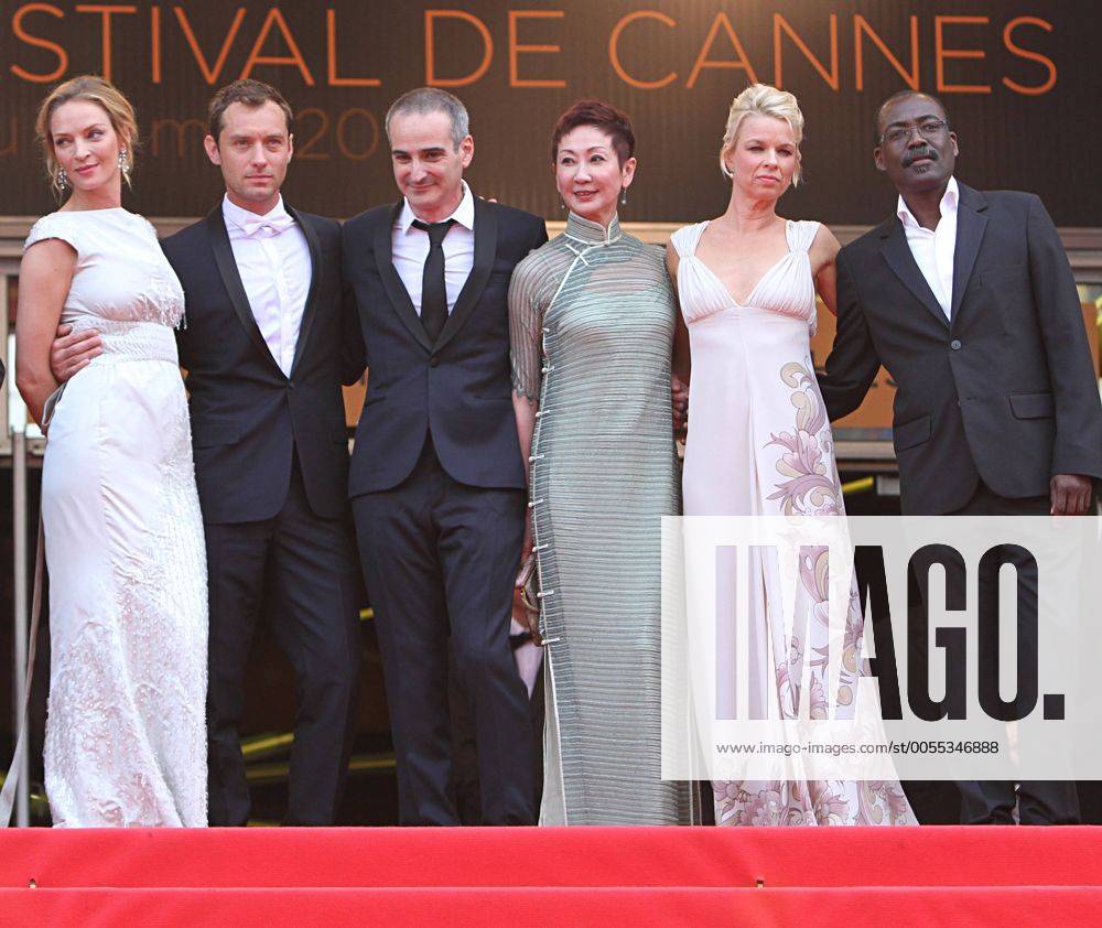 (From L to R) Jury members Uma Thurman, Jude Law, Olivier Assayas, Nansun Shi, Linn Ullmann and Mahamat-Saleh Haroun arrive on the red carpet before the screening of the film Pirates Of The Caribbean: On Stranger Tides during the 64th annual Cannes International Film Festival in Cannes, France on May 14, 2011. CAN20110514754