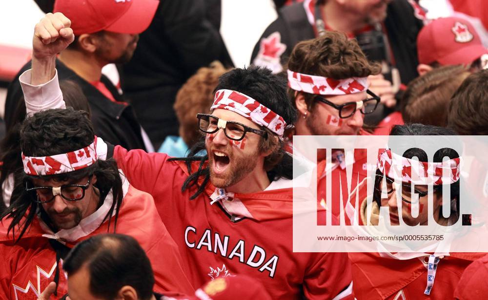 Feb. 24, 2010 - Vancouver, BC, Canada - VANCOUVER, BC: FEBRUARY 24, 2010 -- Team Canada hockey fans dressed as the Hanson brothers make their way to their seats prior to Canada s game in men s hockey game in Vancouver BC Wednesday, February 24, 2010 during the 2010 Olympics. - ZUMAw51