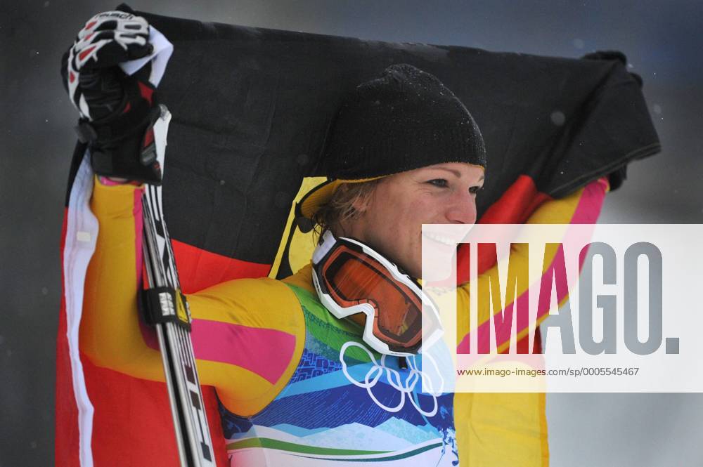 Germany s Maria Riesch celebrates with the Germany flag during the Ladies Slalom Flower Ceremony during the 2010 Vancouver Winter Olympics in Whistler, Canada on February 26, 2010. OLY20100226332 o0 Olympiasieg Sieg Freude Jubel Fahne, Landesfahne Objekte