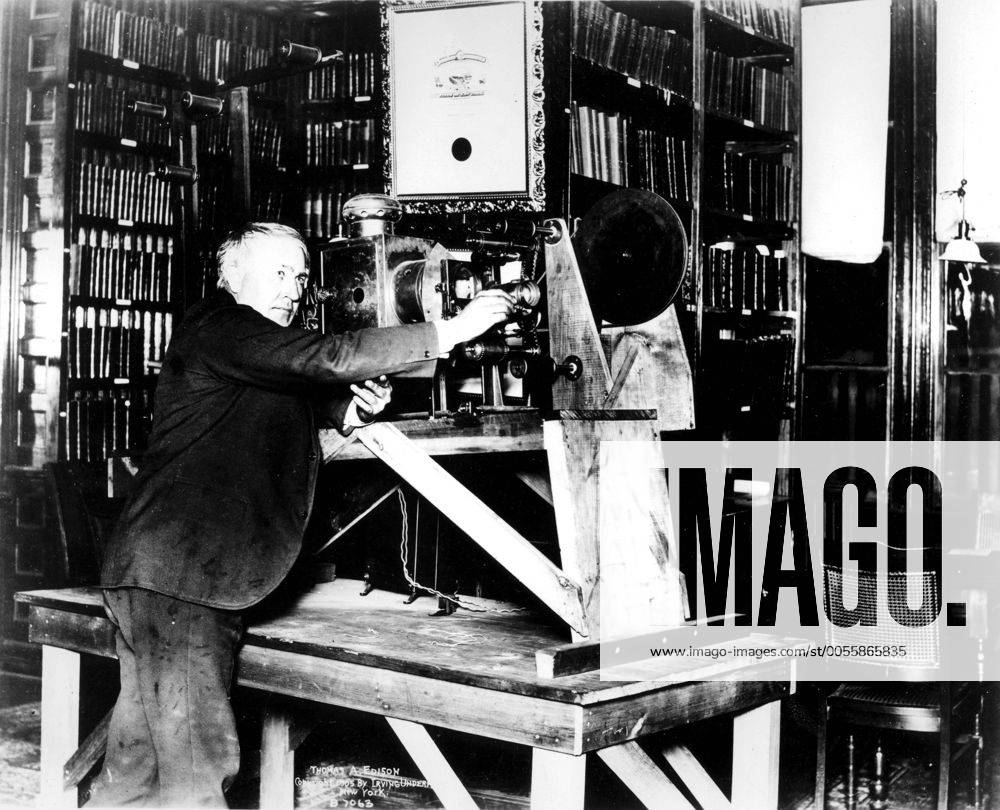 Edison with motion picture machine (not his own make) in West Orange Library 1897 Edison, Thomas Alva (the Wizard of Menlo Park) US inventor; opened research laboratory in Menlo Park, New Jersey 1876 (moved to West Orange, New Jersey 1887); invented phonograph (1st demonstrated 1877); invented incandescent electric light 1879; invented kinetograph camera and kinetoscope motion-picture viewer (patented 1891) _1847-1931 Mono Print UnitedArchives0873588