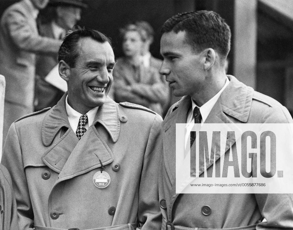 Fred Perry : 18 May 1909 - 2 February 1995 , British tennis and table tennis player , seen here left , the three time Singles Champion talks with Tom Brown an American player . 21 June 1948 Mono Print UnitedArchives1207502