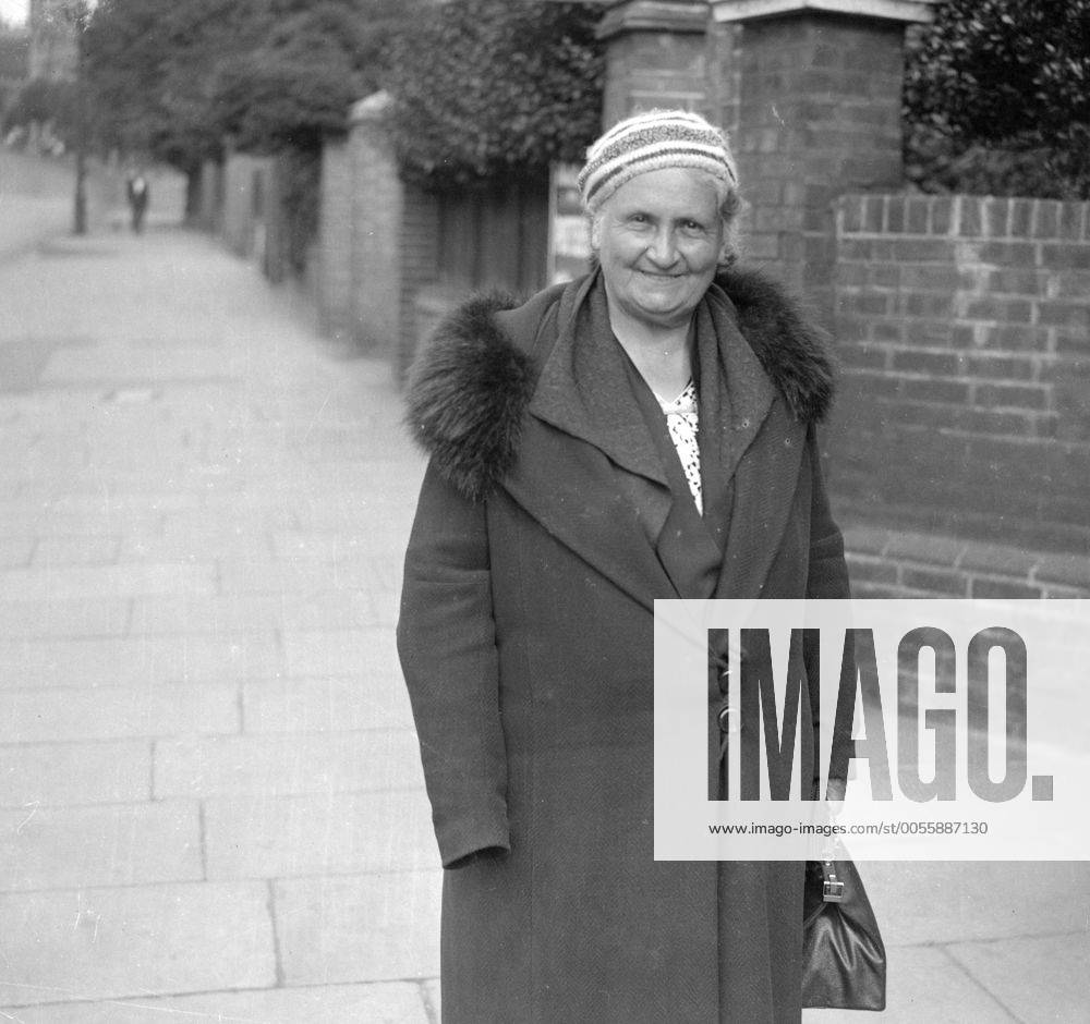 Dr Maria Montessori - the famous educationalist founder of the system of teaching that bears her name - has returned to London after a tour of Europe during which she has given radio lectures on the Social Question of the Child . Dr Montessori established the first Montessori School in Britain in 1912 and her new methods of child teaching have made remarkable progress since she first began her work among the poor children of Rome thirty years ago . Photo shows Dr Maria Montessori - the famous educationalist - at Hampstead where , at the Montessori Training School , she is to conduct an international course for teachers August 11th 1935 Mono Negative UnitedArchives1248289
