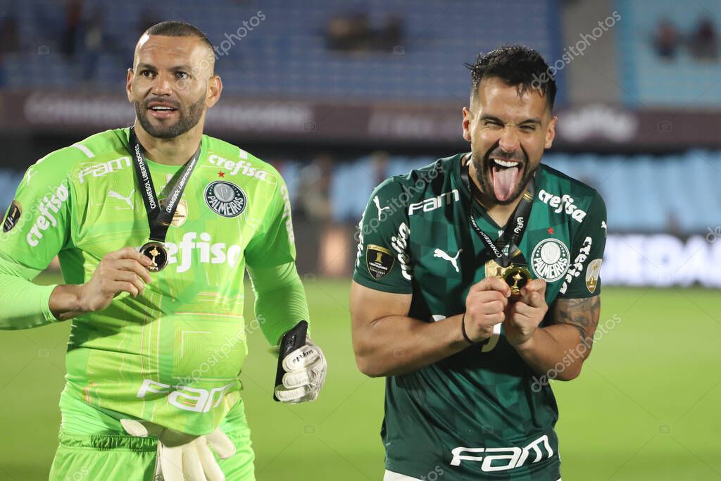 Conmebol Libertadores Final: Palmeiras and Flamengo: November 27, 2021, Montevideo, Uruguay. Palmeiras players celebrate the Trichampionship of Conmebol Libertadores after a 2-1 victory over Flamengo, in a soccer match held at the Centenario stadium