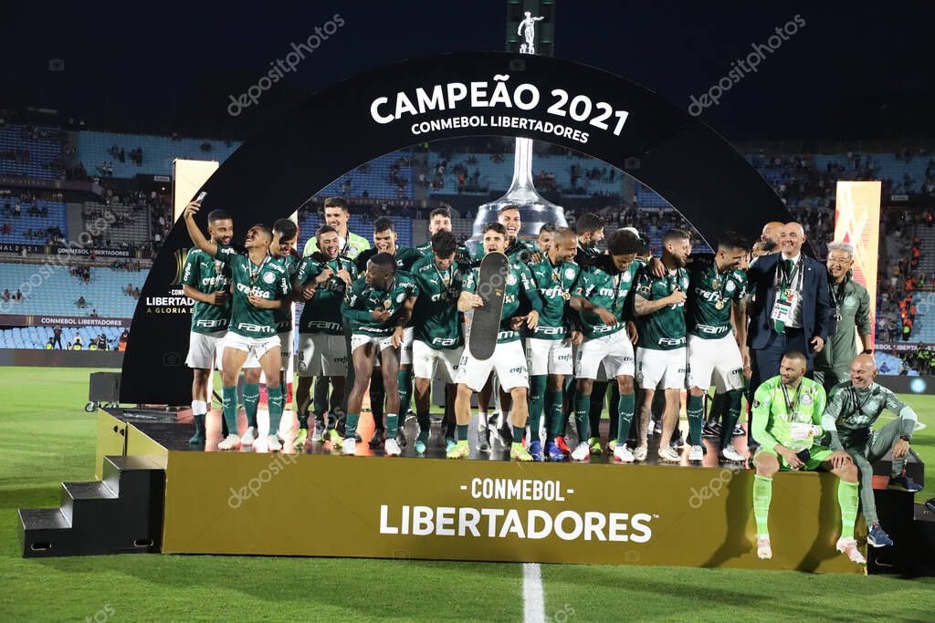 Conmebol Libertadores Final: Palmeiras and Flamengo: November 27, 2021, Montevideo, Uruguay. Palmeiras players celebrate the Trichampionship of Conmebol Libertadores after a 2-1 victory over Flamengo, in a soccer match held at the Centenario stadium
