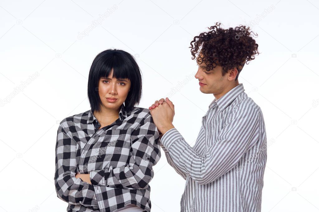 Young couple modern clothes posing fun friendship. High quality photo model released