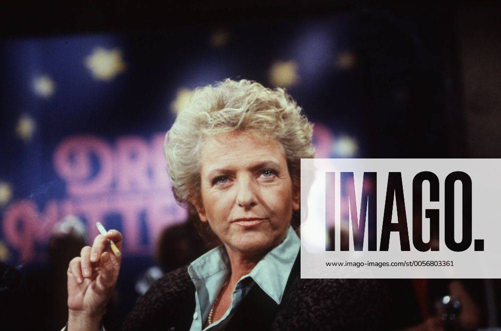 Gisela Marx 01 90 hör Frau Fernsehen TV Journalismus Moderation Talkshow blond kurzhaarig seriös quer Portrait Studio Kulisse gestikulierend