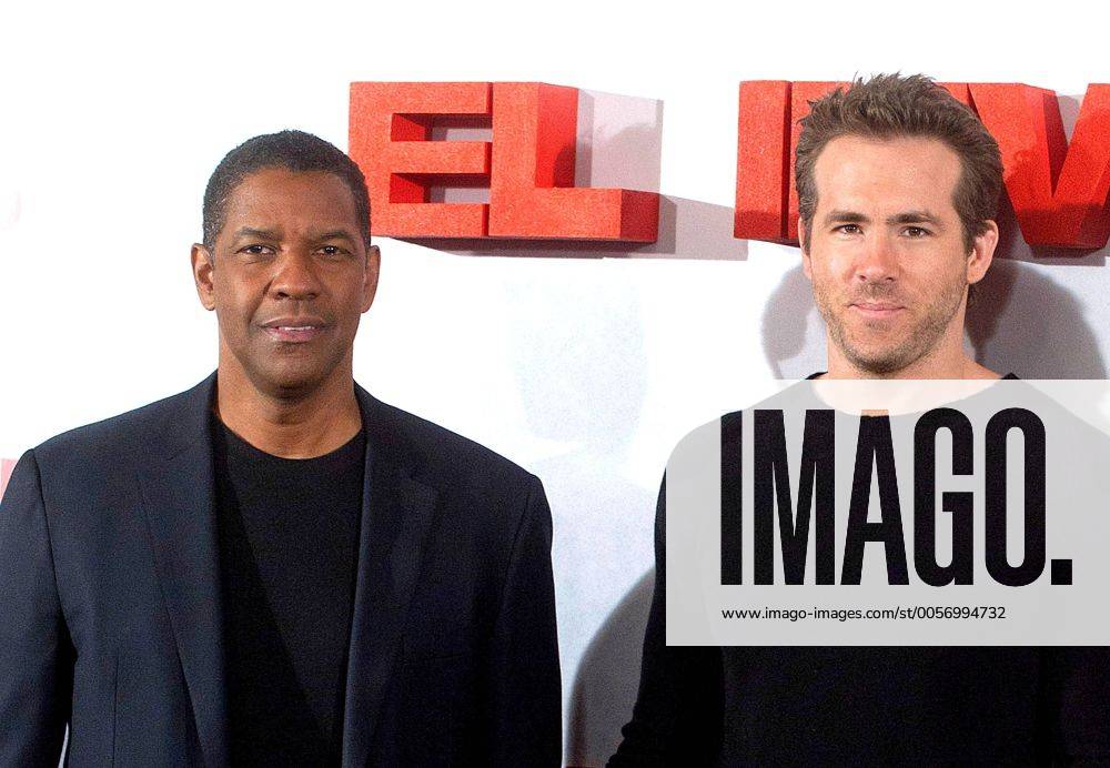 Denzel Washington und Ryan Reynolds bei dem Photocall zu dem Film Safe House am 31.01.2012 in Madrid Safe House Madrid Photocall 2012