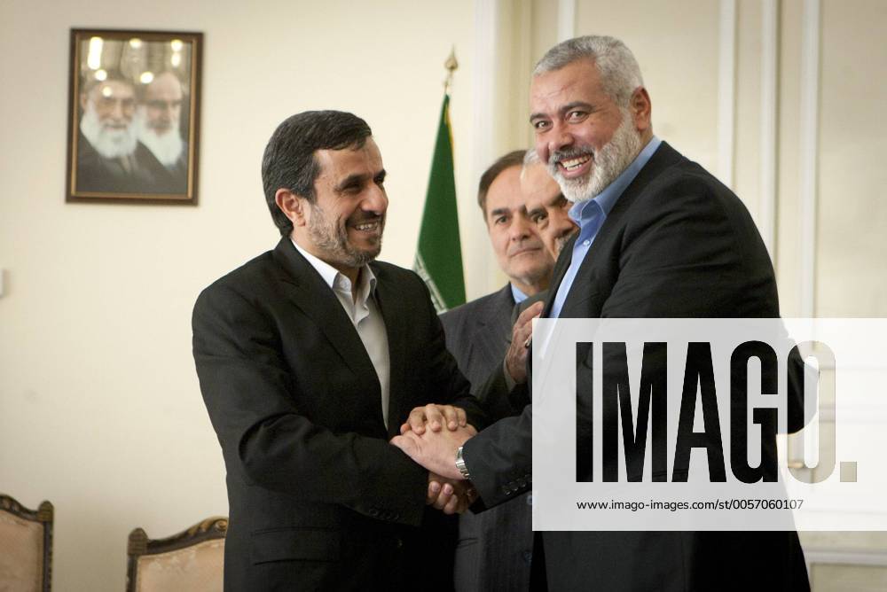 (120212) -- TEHRAN, Feb. 12, 2012 (Xinhua) -- Iranian President Mahmoud Ahmadinejad (L) shakes hands with visiting Hamas leader Ismail Haniyeh during their meeting in Tehran, capital of Iran, on Feb. 12, 2012. (Xinhua Ahmad Halabisaz) (nxl) IRAN-TEHRAN-AHMADINEJAD-HAMAS-HANIYEH-MEETING