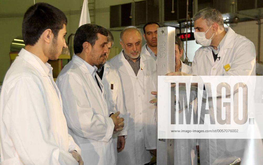 A handout picture released by the Iranian President Mahmoud AhmadinejadâÄ?s official website shows Ahmadinejad (2nd,L) and Iranian Foreign Minister Ali Akbar Salehi (C) visiting TehranâÄ?s nuclear reactor during the unveiling ceremony on February 15, 2012 in Tehran, Iran. Iran simultaneously unveiled three new nuclear projects on Wednesday. TEH20120215102