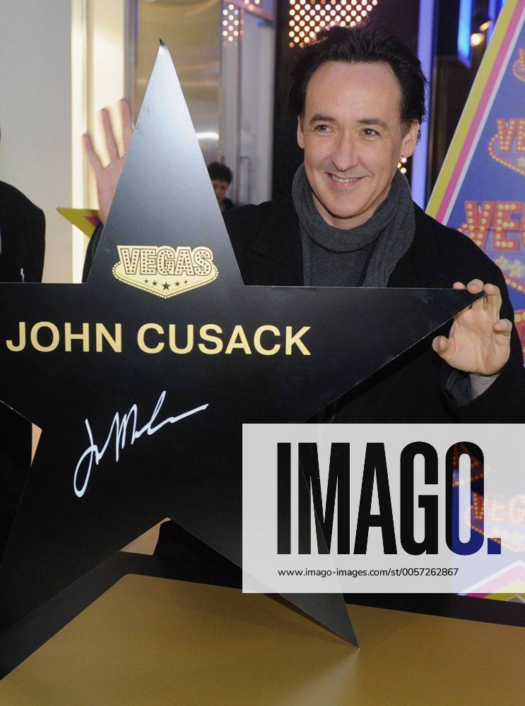 ITAR-TASS: MOSCOW, RUSSIA. MARCH 7, 2012. American actor John Cusack receives a Star on the walk of fame at Moscow s Vegas Shopping and Leisure Centre. Highlight premiumd RE0F97F2