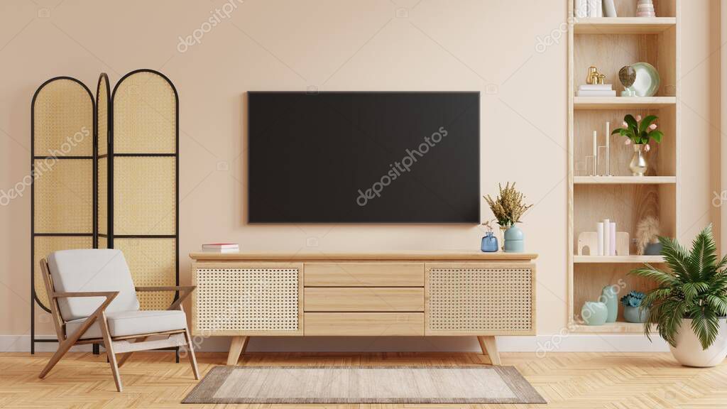 Modern interior of living room with TV,cabinet and armchair in cream color wall background,3d rendering