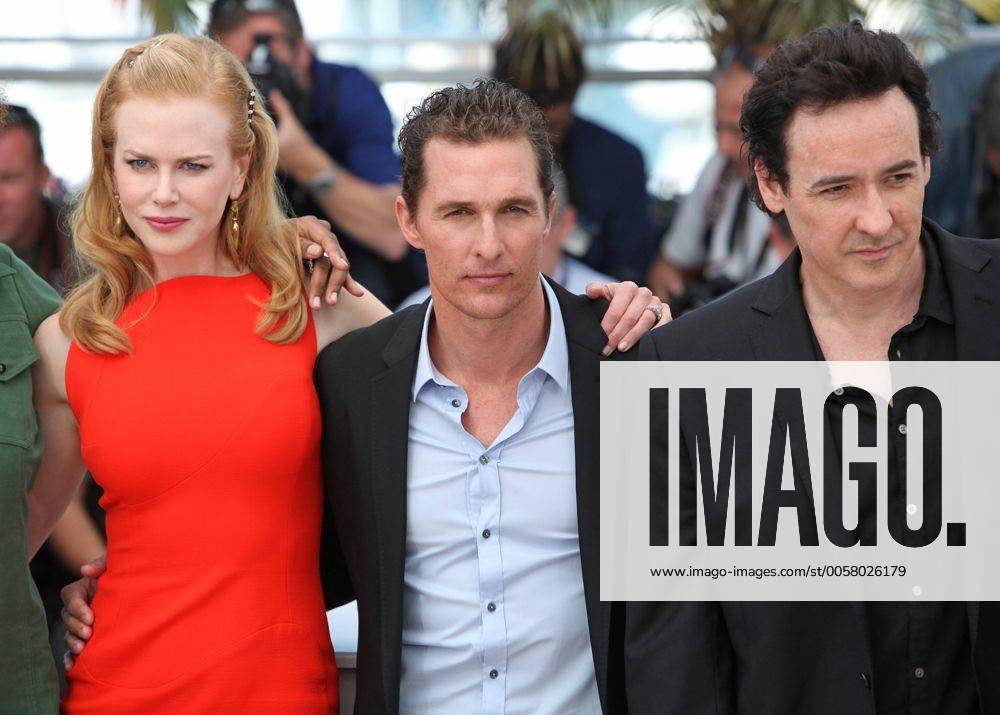 Nicole Kidman (L), Matthew McConaughey (C) and John Cusack arrive at a photocall for the film The Paperboy during the 65th annual Cannes International Film Festival in Cannes, France on May 24, 2012. CAN20120524739