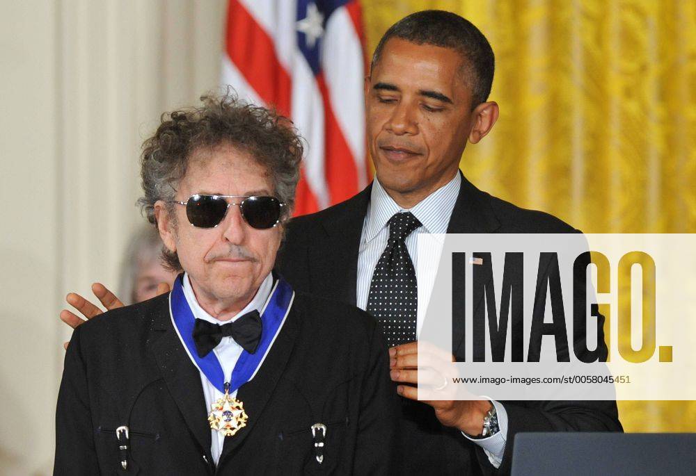 President Barack Obama awards the the Presidential Medal of Freedom to singer songwriter Bob Dylan during a ceremony in the East Room at the White House in Washington on May 29, 2012. The Medal of Freedom is our NationÕs highest civilian honor, presented to individuals who have made especially meritorious contributions to the security or national interests of the United States, to world peace, or to cultural or other significant public or private endeavors. WAP20120529303