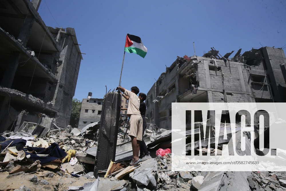 Palestinians search the rubble of the Harb family home which was hit in overnight Israeli strikes in al-Bureij refugee camp Palestinians search the rubble of the Harb family home which was hit in overnight Israeli strikes in al-Bureij refugee camp in the central Gaza Strip, on June 18, 2024, amid the ongoing Israel war on Gaza. Photo by Omar Ashtawy apaimages al-Bureij Gaza Strip Palestinian Territory 180624_Bureij_OSH_00(47)