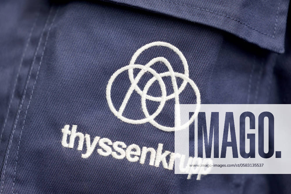 ThyssenKrupp Steel Werk Ferndorf ThyssenKrupp Steel invests in expansion of production capacities in Siegerland Production capacities for zinc magnesium products for the solar industry and further plant modernization ThyssenKrupp lettering and logo on a work jacket ThyssenKrupp Steel Werk Ferndorf on 18 06 2024 in Kreuztal Germany