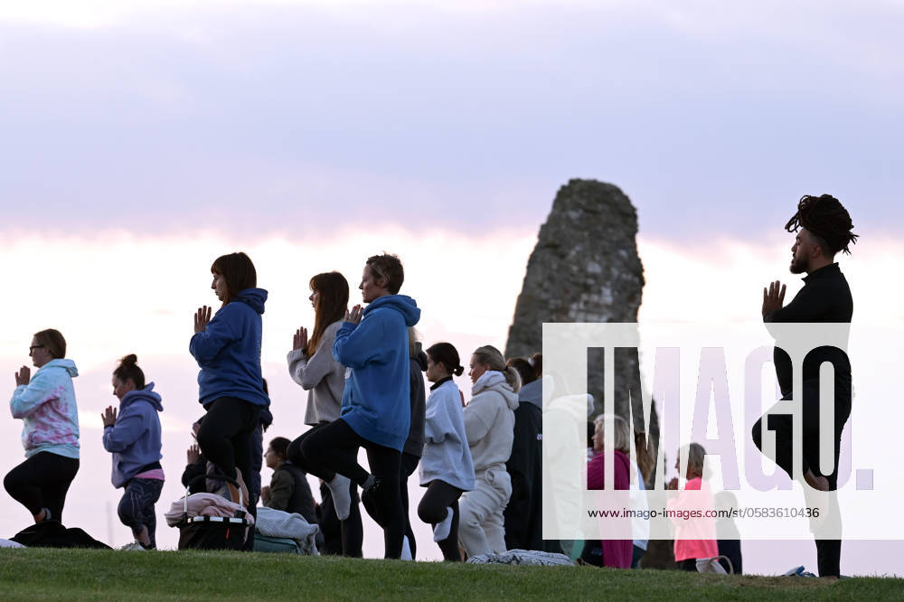 Summer Solstice Sunrise A Yoga class in the grounds of Hadleigh Castle in Essex UK greet the sunrise on the morning of the summer solstice. The sun rose at 04:40am and sets at 9:19pm on what is the longest day of the year. The official time of the summer solstice in the UK is 9:50pm on 20 June 2024. Essex Hadleigh Castle UK