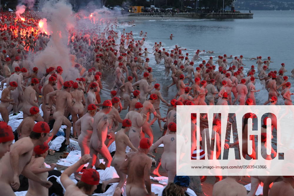 DARK MOFO WINTER SOLSTICE SWIM HOBART, Swimmers participate in the annual nude winter solstice swim during Hobart s Dark Mofo festival at Long Beach in Darwin, Friday, June 21, 2024. ( NO ARCHIVING, , NO USE IN BOOKS WITHOUT CONSENT HOBART TAS AUSTRALIA