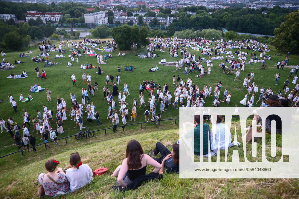 Summer Solstice Celebration In Poland Participants celebrating the summer solstice gathered for the Kupala Night by the Krakus Mound in Krakow, Poland on June 20th, 2024. The Kupała Night is Old Slavic holiday falling on the shortest night of the year. During that night rituals were performed such as gathering and making crowns from herbs and wild flowers by girls and young women, sending garlands on water; lighting fires, dancing, singing, and jumping over fire. Krakow Poland