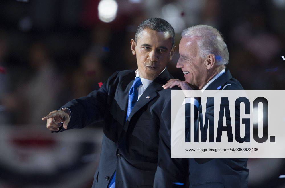 (121107) -- CHICAGO, Nov. 7, 2012 (Xinhua) -- U.S. President Barack Obama (L) and Vice President Joe Biden acknowledge supporters at the election night rally in Chicago, the United States, on Nov. 7, 2012. U.S. President Barack Obama has beaten his Republican challenger Mitt Romney to win a second term at the White House, TV networks projected Tuesday. (Xinhua Yang Lei) (lyx) U.S.-CHICAGO-OBAMA-ELECTION NIGHT RALLY
