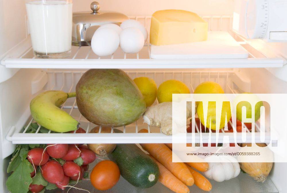 Dairy products, fruits and vegetables in a refrigerator 1045000106
