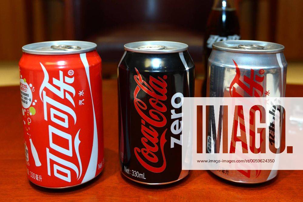 (130510) -- BEIJING, May 10, 2013 (Xinhua) -- Photo taken on May 9, 2013 shows the canned drink of Coca-Cola in Beijing, capital of China. The Coca-Cola Company announced here on Thursday that it will continue to increase investment levels in China. Ahmet Bozer, president of Coca-Cola International, said during an interview that 4 billion U.S. dollars of investment will be added by 2014 in China. And he explained that the investment is mixed with marketing assets like plants, transportation and retail outlets. (Xinhua Wu Kaixiang) CHINA-BEIJING-COCA-COLA-INVESTMENT (CN)