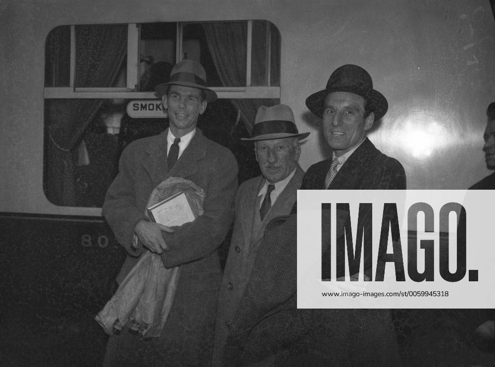FJ.Perry returns from America to make first professional appearance in England. Fred Perry with his father and Ellsworth Vines on arrival at Paddington. 21st May 1937 UnitedArchives00134208