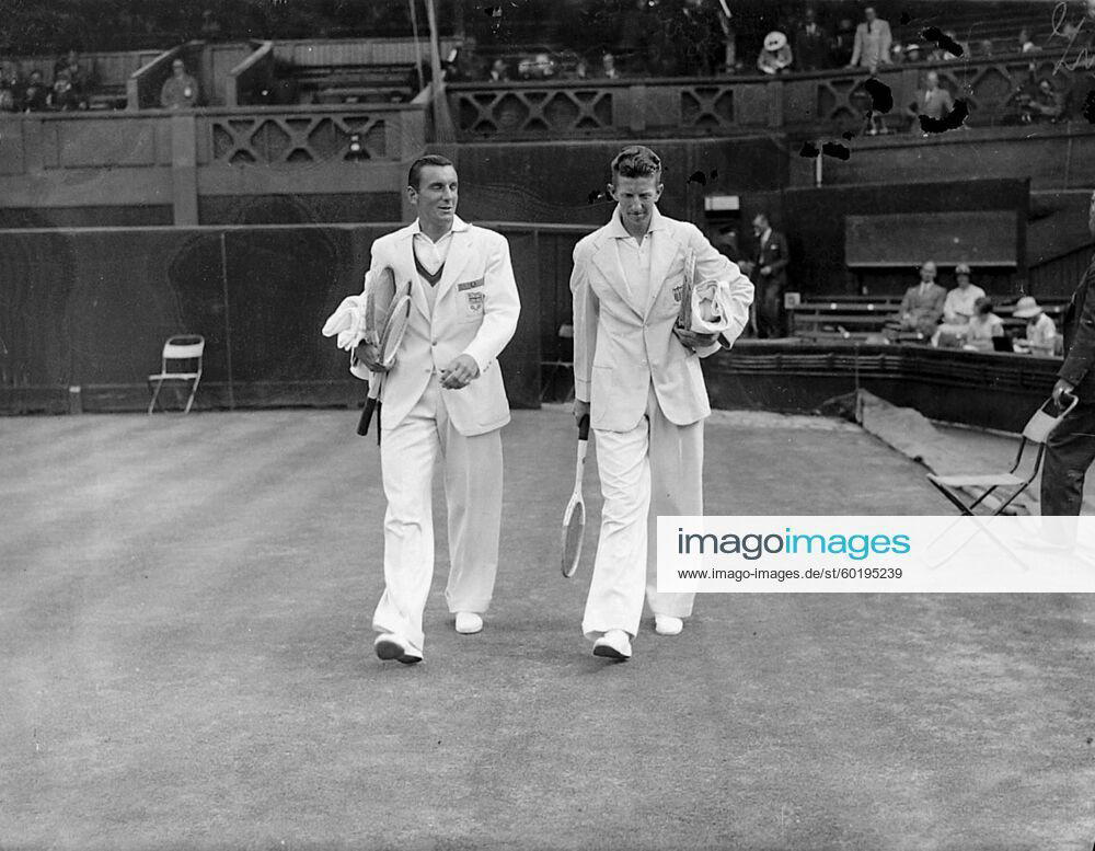 Fred Perry took the first set from D Budge of America 6-0 when they met in the second singles match of the Davis Cup challenge round at Wimbledon Photo shows Perry and Budge going onto the court 27th July 1935 UnitedArchives00953657