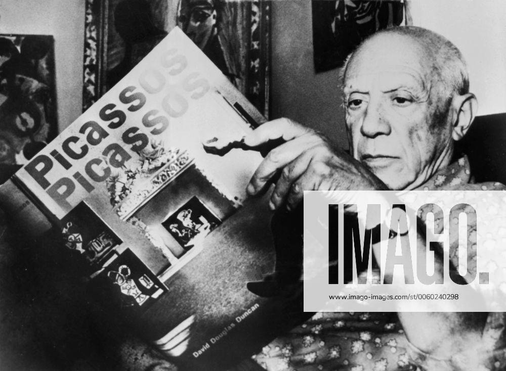 PABLO PICASSO INSPECTS A BOOK ABOUT HIS WORKS BY DAVID DOUGLAS DUNCAN THAT IS DUE TO COME OUT ON HIS 80TH BIRTHDAY. PICTURED AT PICASSO S HOME LA CALIFORNIA IN VALLAURIS, FRANCE. UnitedArchives01074180
