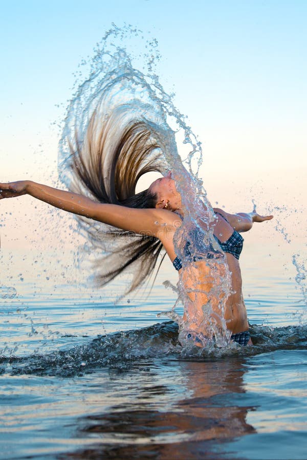 Blonde woman on water bckground, Beautiful blonde bikini woman on water bckground model released