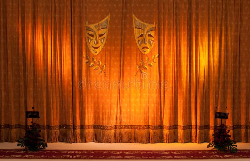 Comedy Tragedy, Theatrical masks on the curtains