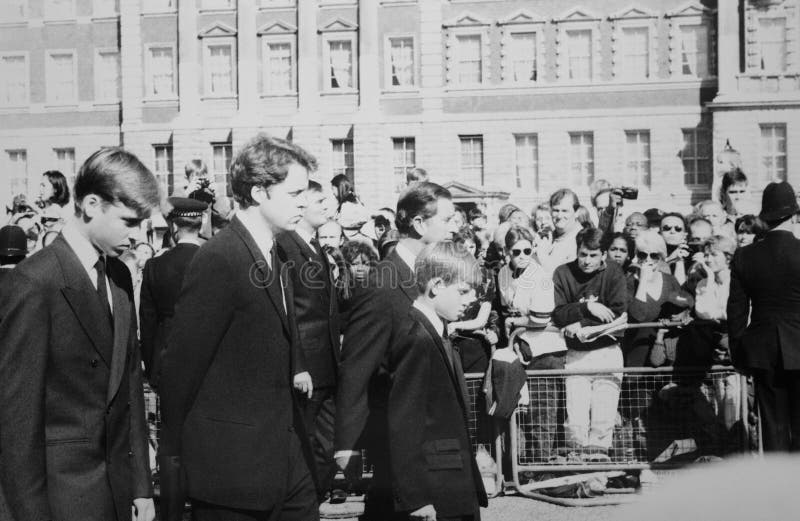 Royal Princes at the funeral of Diana Princess of Wales., London, UK. 6th September 1997. The funeral of Diana, Princess of Wales. Walking behind the coffin as they approach Horse Guards Parade, are Prince Charles, Princes William, Prince Harry and Earl Charles Spencer. Original image taken on 35mm film.