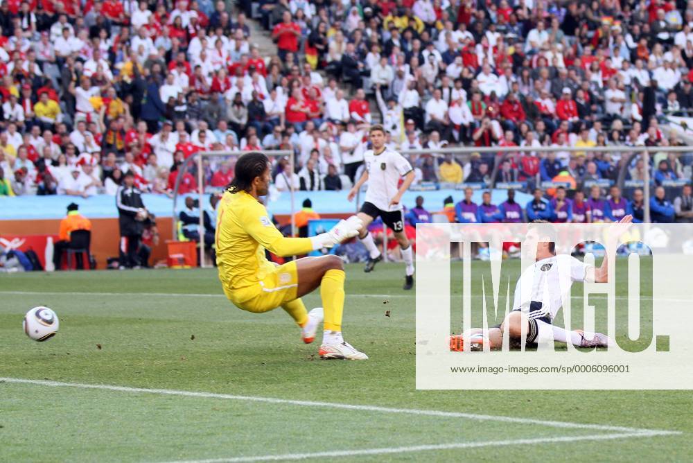 Germany s Miroslav Klose (R) scoring his sides opening goal against England s David James - FIFA World Cup 2010 Round of 16 Germany v England 27th June, 2010 . o0 Tor