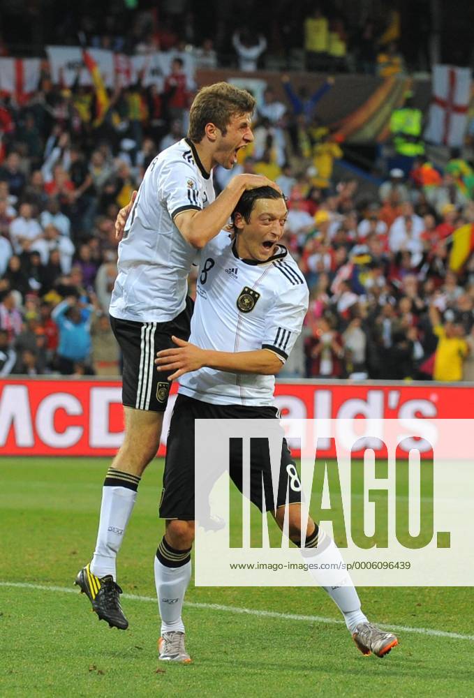 Thomas Mueller of Germany (L) celebrates scoring their fourth goal with Mesut Oezil of Germany FIFA World Cup 2010 Round of 16 Germany v England 27th June, 2010 . o0 Freude Emotionen