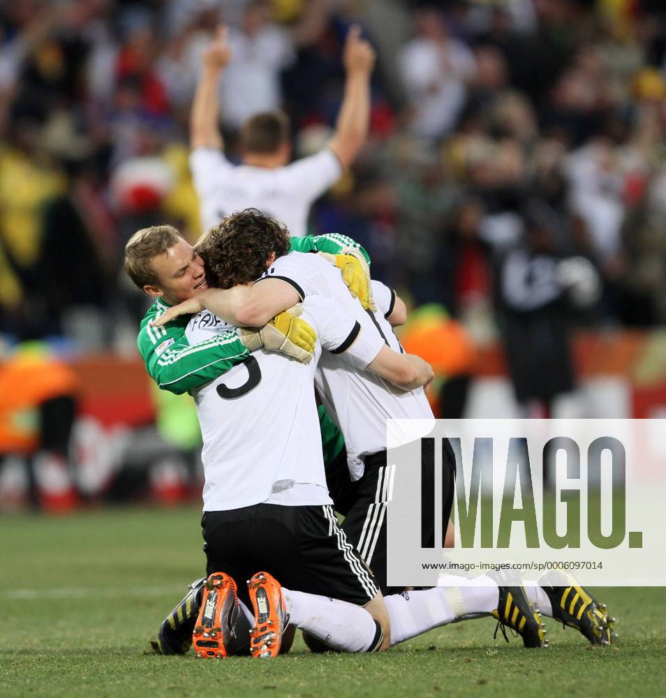 Germany s Manuel Neuer (L) celebrates his side fourth goal with Arne Friedrich (2L) - FIFA World Cup 2010 Round of 16 Germany v England (red) - 27th June, 2010 - .